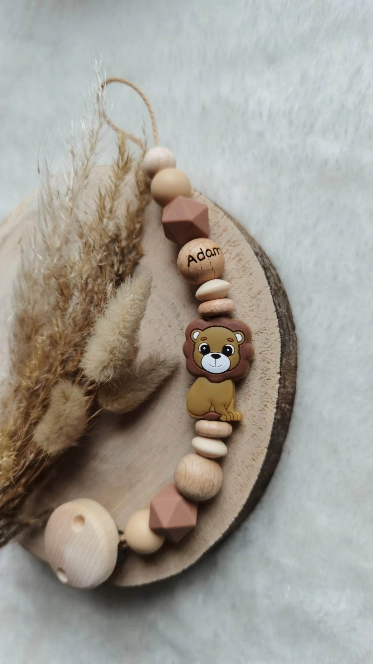Schnullerkette Löwe